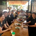 Happy breakfast with 3the Myanmar koi show attendees .